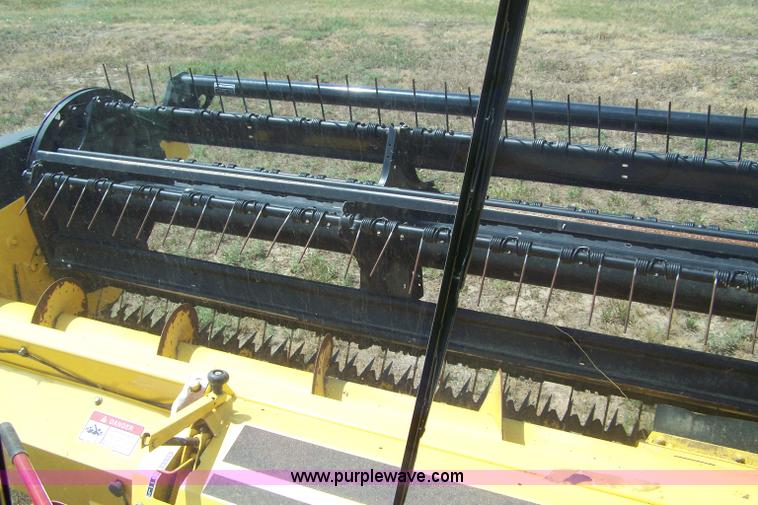 image for item A4588 New Holland H8040 swather