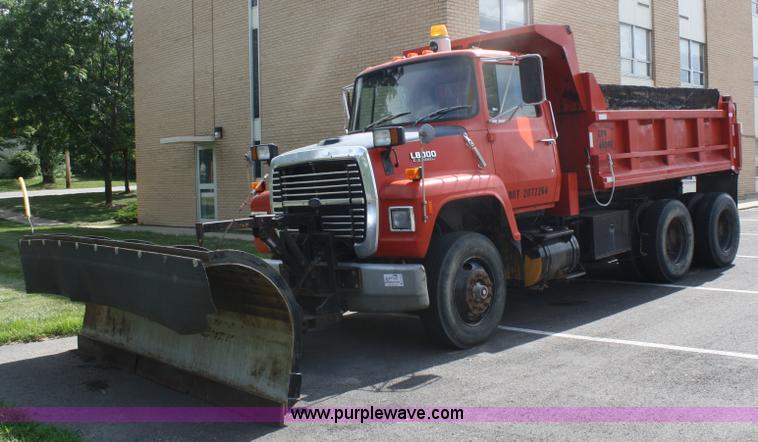 image for item A2134 1989 Ford L8000 dump truck with snow plow