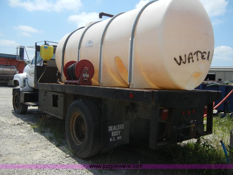 image for item A3015 1991 GMC Topkick 7000 water truck
