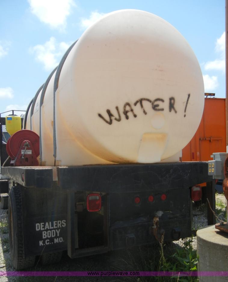 image for item A3015 1991 GMC Topkick 7000 water truck