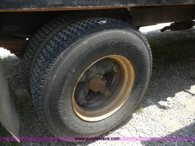 image for item A3015 1991 GMC Topkick 7000 water truck