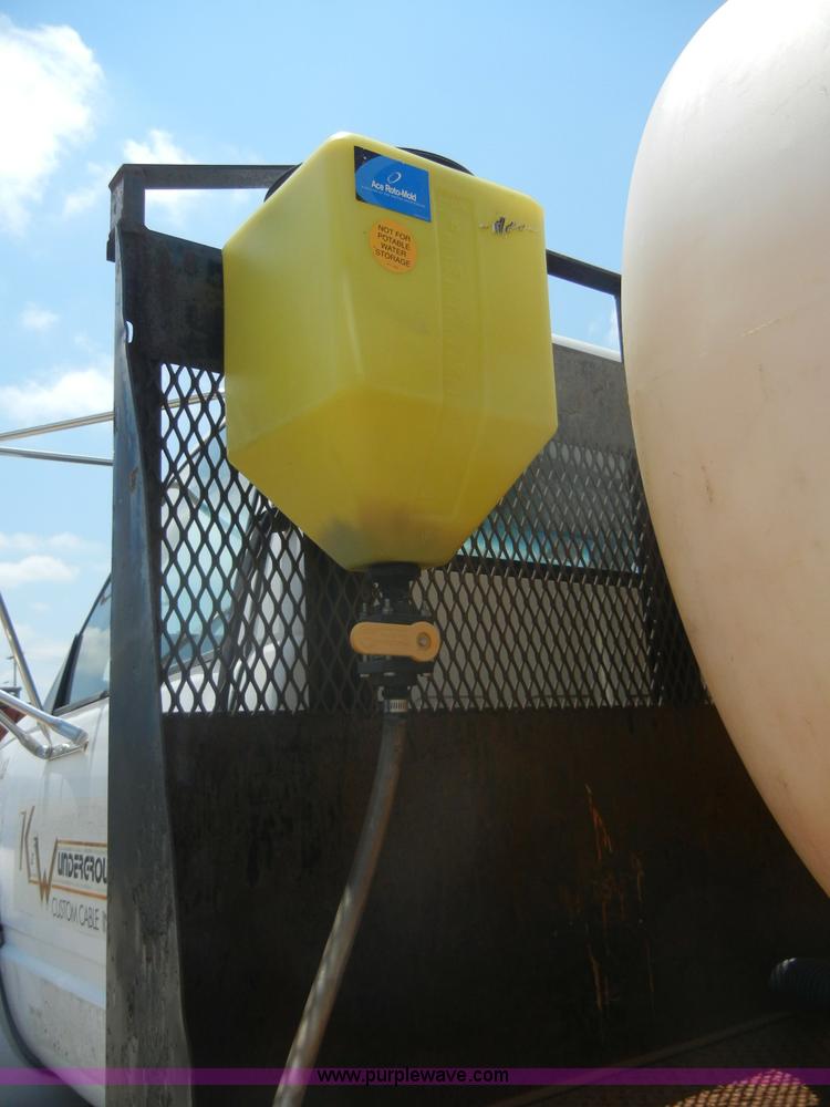 image for item A3015 1991 GMC Topkick 7000 water truck