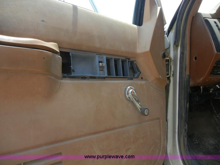 image for item A3015 1991 GMC Topkick 7000 water truck