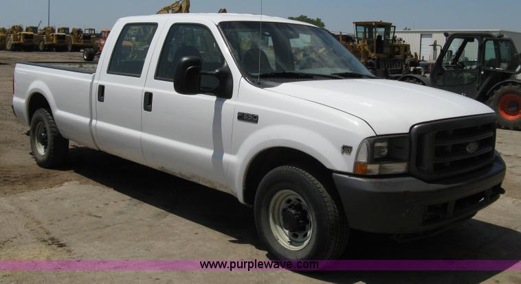 image for item A4263 2004 Ford F350 Super Duty XL crew cab pickup truck