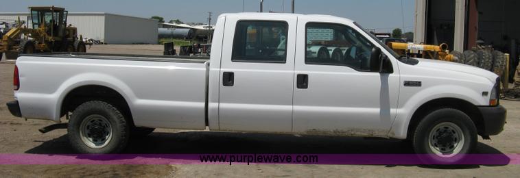 image for item A4263 2004 Ford F350 Super Duty XL crew cab pickup truck