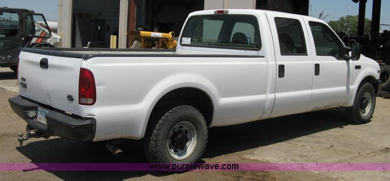 image for item A4263 2004 Ford F350 Super Duty XL crew cab pickup truck