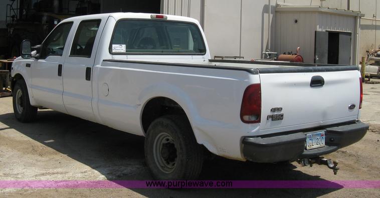 image for item A4263 2004 Ford F350 Super Duty XL crew cab pickup truck