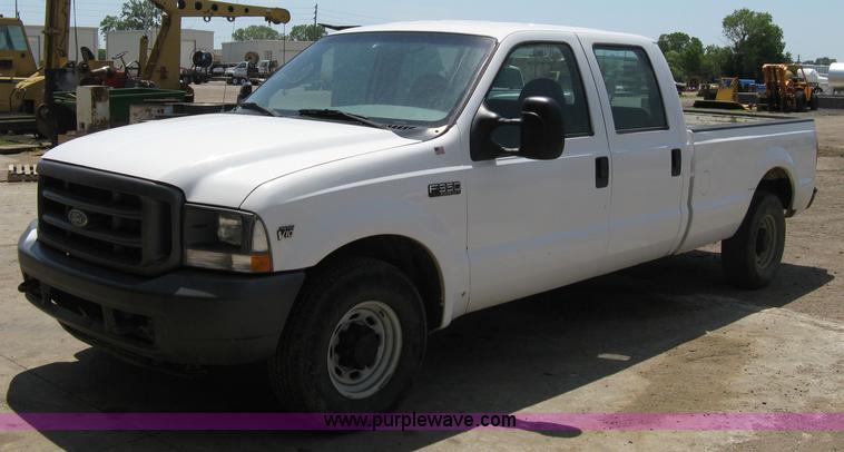 image for item A4263 2004 Ford F350 Super Duty XL crew cab pickup truck