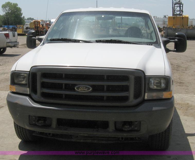 image for item A4263 2004 Ford F350 Super Duty XL crew cab pickup truck
