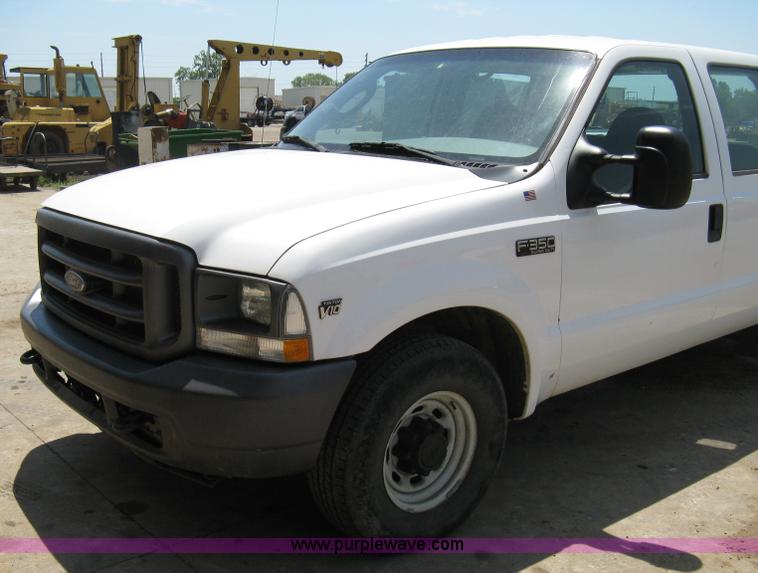 image for item A4263 2004 Ford F350 Super Duty XL crew cab pickup truck