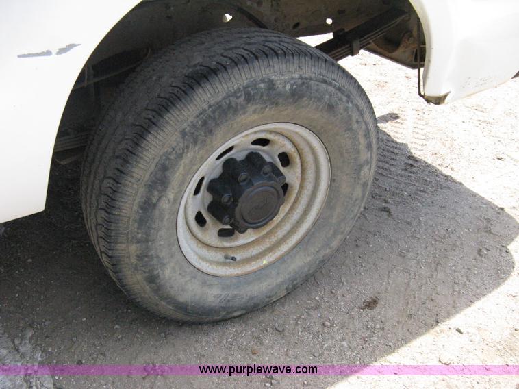 image for item A4263 2004 Ford F350 Super Duty XL crew cab pickup truck