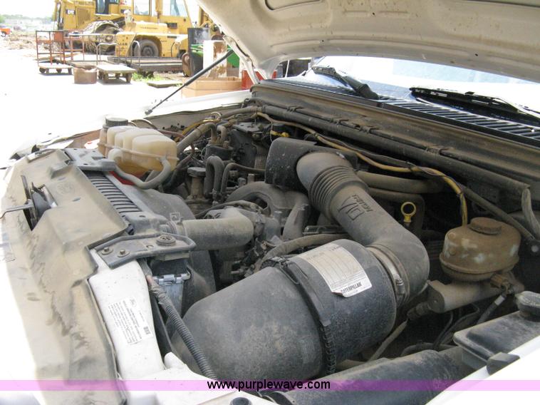 image for item A4263 2004 Ford F350 Super Duty XL crew cab pickup truck