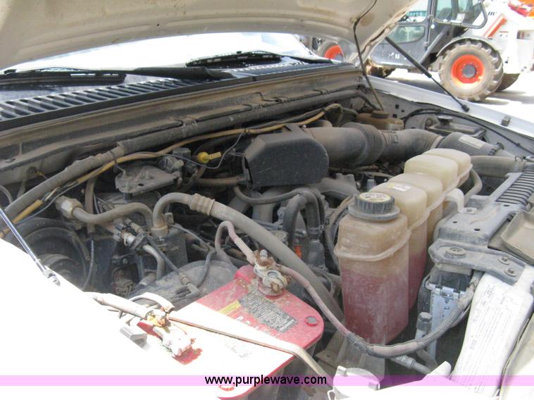 image for item A4263 2004 Ford F350 Super Duty XL crew cab pickup truck