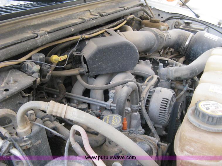 image for item A4263 2004 Ford F350 Super Duty XL crew cab pickup truck