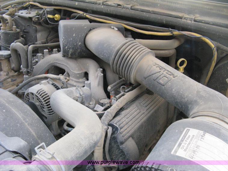 image for item A4263 2004 Ford F350 Super Duty XL crew cab pickup truck