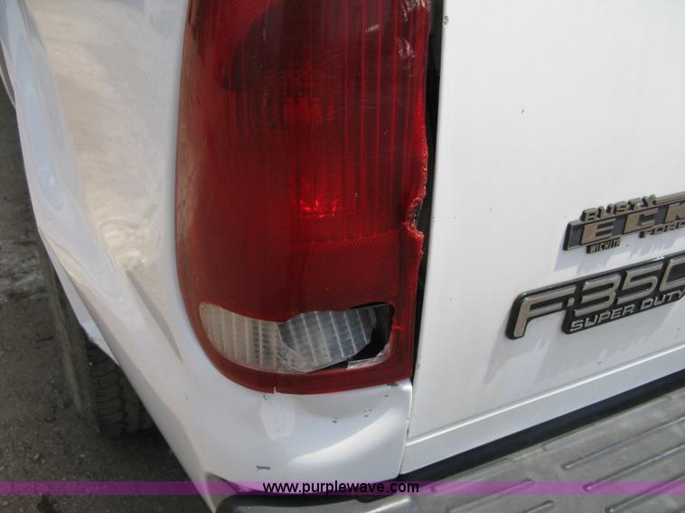 image for item A4263 2004 Ford F350 Super Duty XL crew cab pickup truck