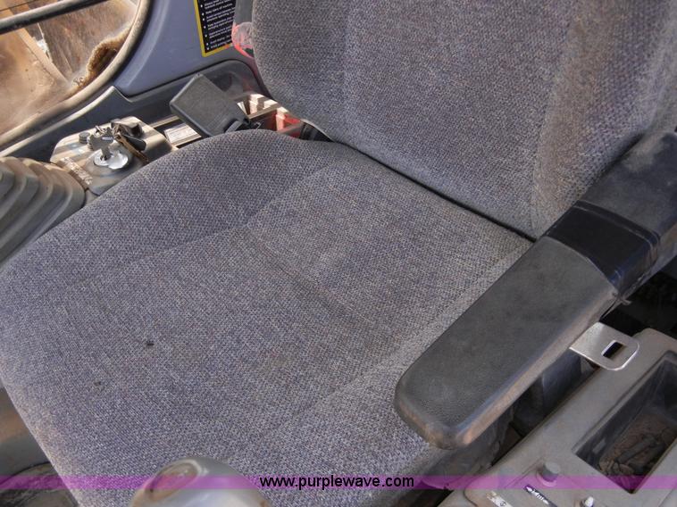 image for item A5399 1999 John Deere 120 excavator