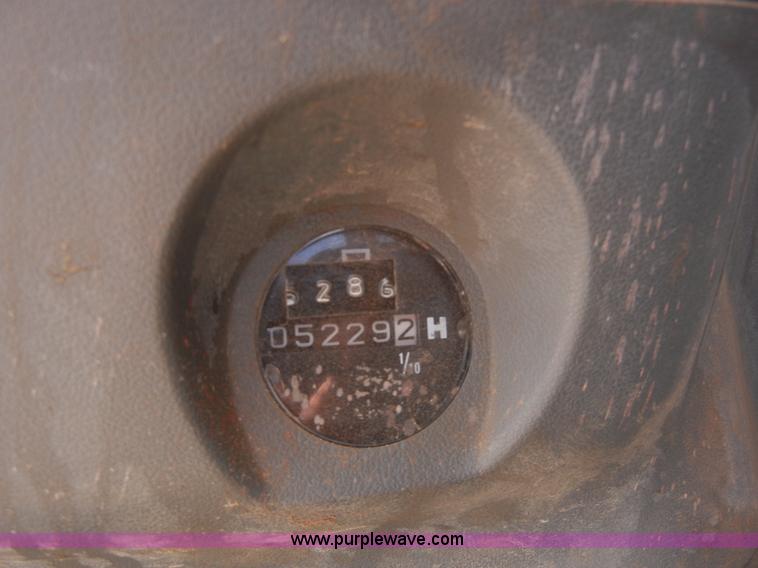 image for item A5399 1999 John Deere 120 excavator