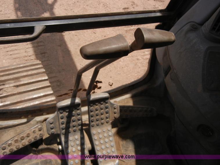 image for item A5399 1999 John Deere 120 excavator