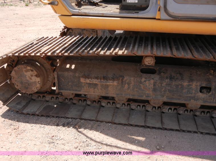 image for item A5399 1999 John Deere 120 excavator