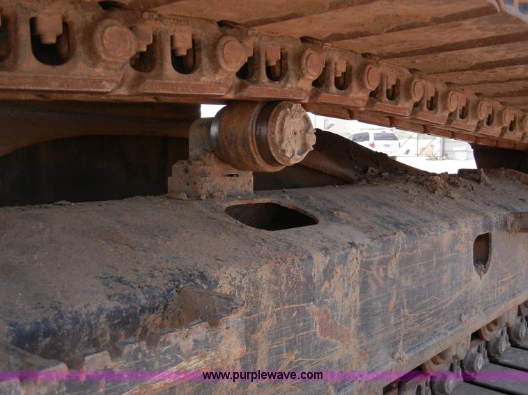 image for item A5399 1999 John Deere 120 excavator