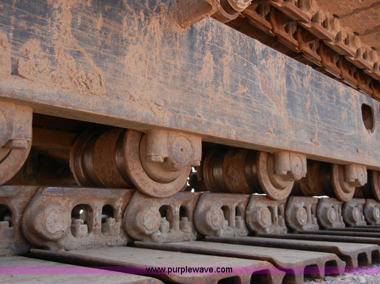 image for item A5399 1999 John Deere 120 excavator