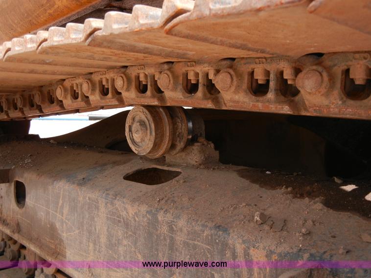 image for item A5399 1999 John Deere 120 excavator