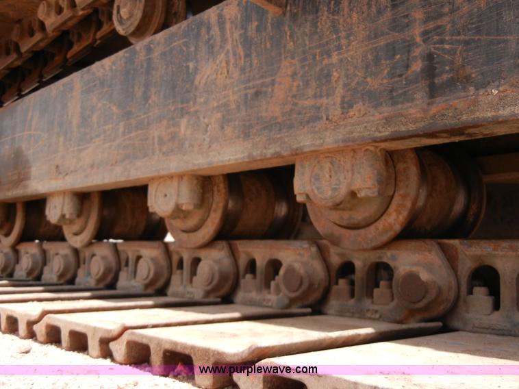 image for item A5399 1999 John Deere 120 excavator