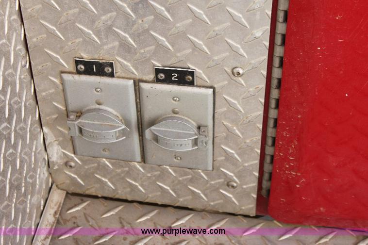 image for item A2569 1984 Ford F700 fire truck