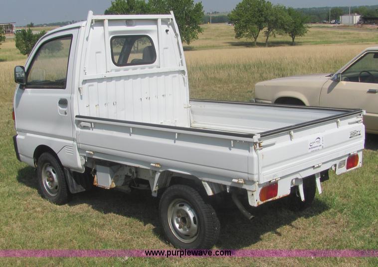 image for item A3675 1992 Mitsubishi mini pickup truck
