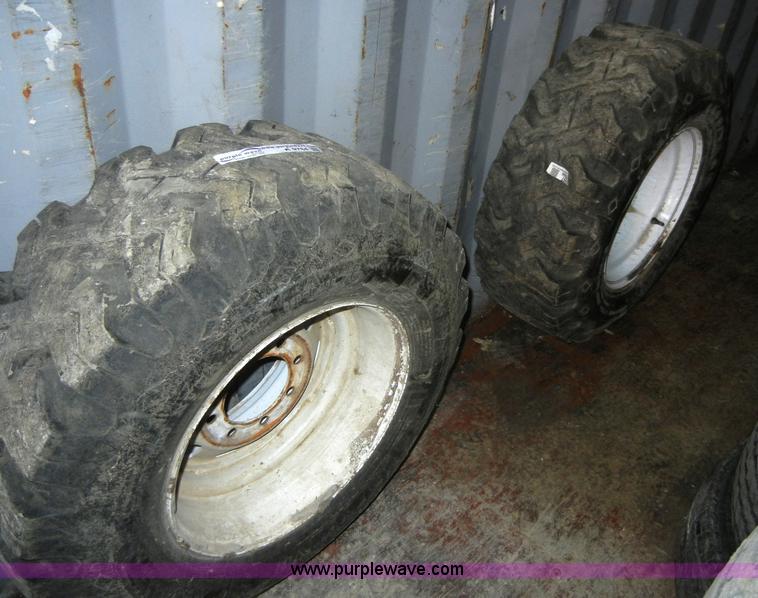 image for item A9784 (2) 12-16.5LT Goodyear tires on eight hole rims