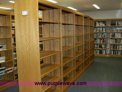 image for item A9969 (4) light oak wooden shelving units