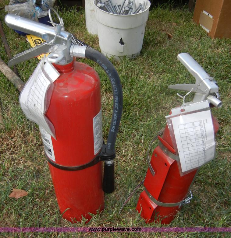 (2) fire extinguishers in Fort Riley, KS Item D9620 sold Purple Wave