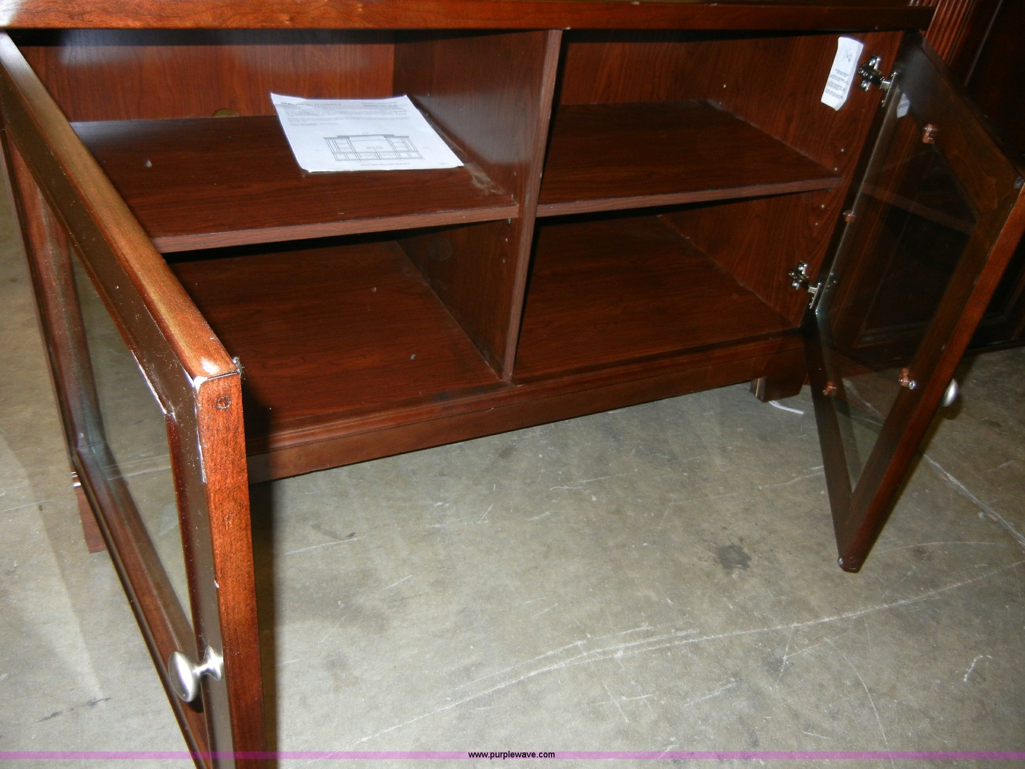 Assorted furniture in Topeka, KS Item A9813 sold Purple Wave