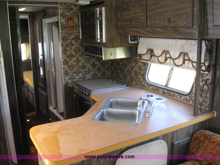 image for item 6813 1975 The Executive 30' camper