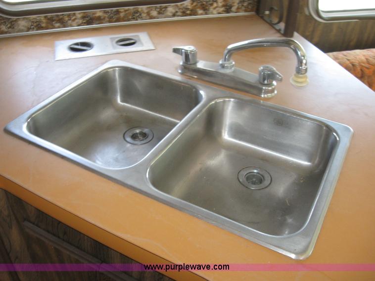 image for item 6813 1975 The Executive 30' camper