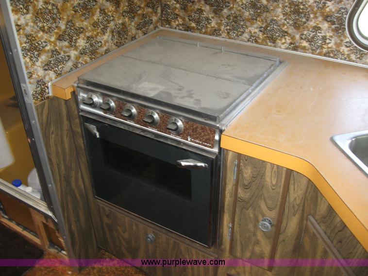 image for item 6813 1975 The Executive 30' camper