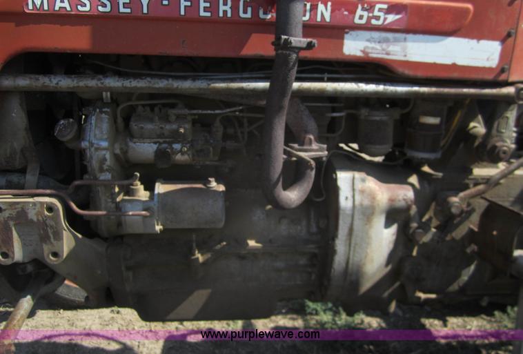 image for item A3846 1964 Massey-Ferguson 65 tractor with mower and back blade