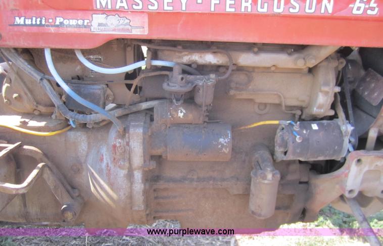 image for item A3846 1964 Massey-Ferguson 65 tractor with mower and back blade