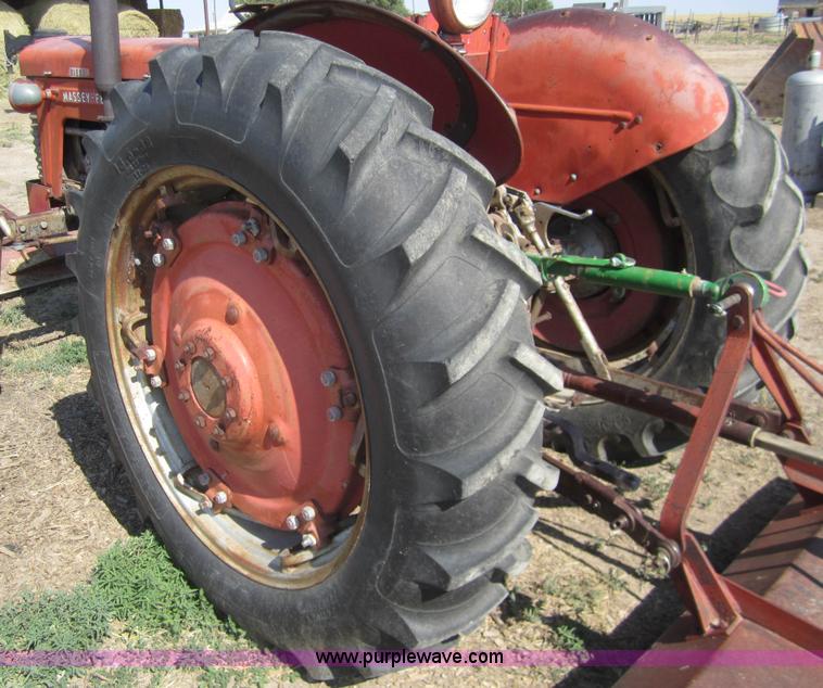 image for item A3846 1964 Massey-Ferguson 65 tractor with mower and back blade
