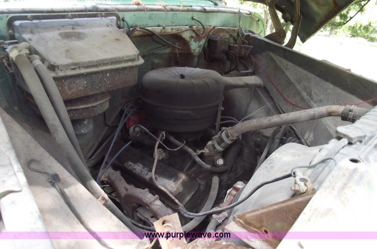 image for item A4145 1965 Chevrolet C60 truck with dump bed