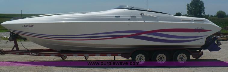 image for item A4851 1995 Baja 320 OS 32' boat and trailer