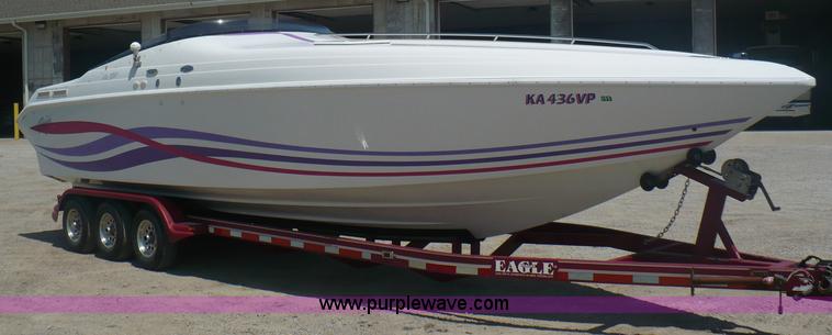 image for item A4851 1995 Baja 320 OS 32' boat and trailer