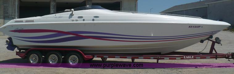 image for item A4851 1995 Baja 320 OS 32' boat and trailer