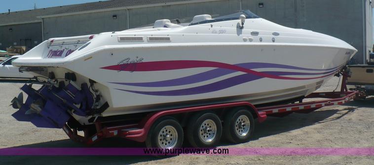 image for item A4851 1995 Baja 320 OS 32' boat and trailer