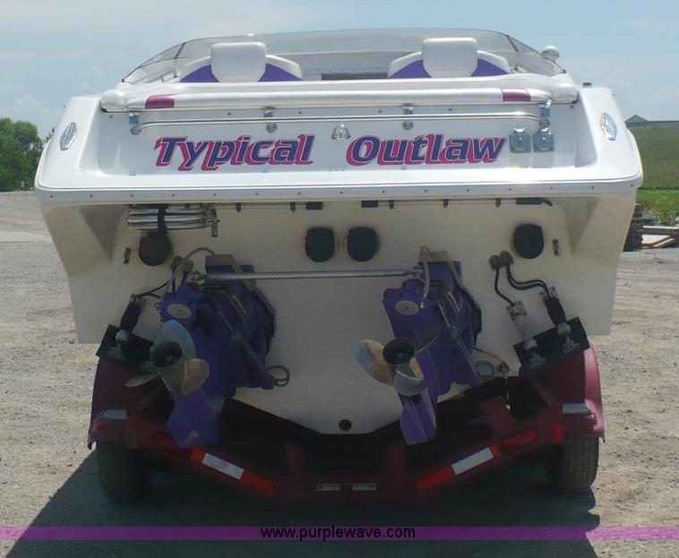 image for item A4851 1995 Baja 320 OS 32' boat and trailer