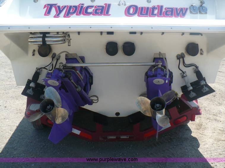 image for item A4851 1995 Baja 320 OS 32' boat and trailer