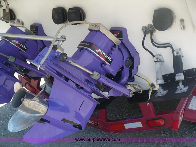 image for item A4851 1995 Baja 320 OS 32' boat and trailer