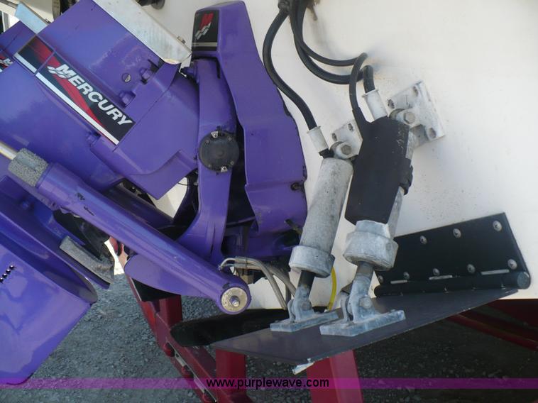 image for item A4851 1995 Baja 320 OS 32' boat and trailer