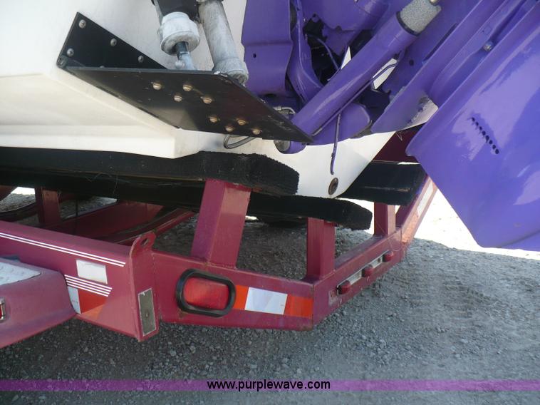 image for item A4851 1995 Baja 320 OS 32' boat and trailer